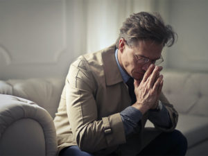 Image of a man contemplating life