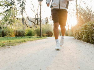 Photo of a man jogging.